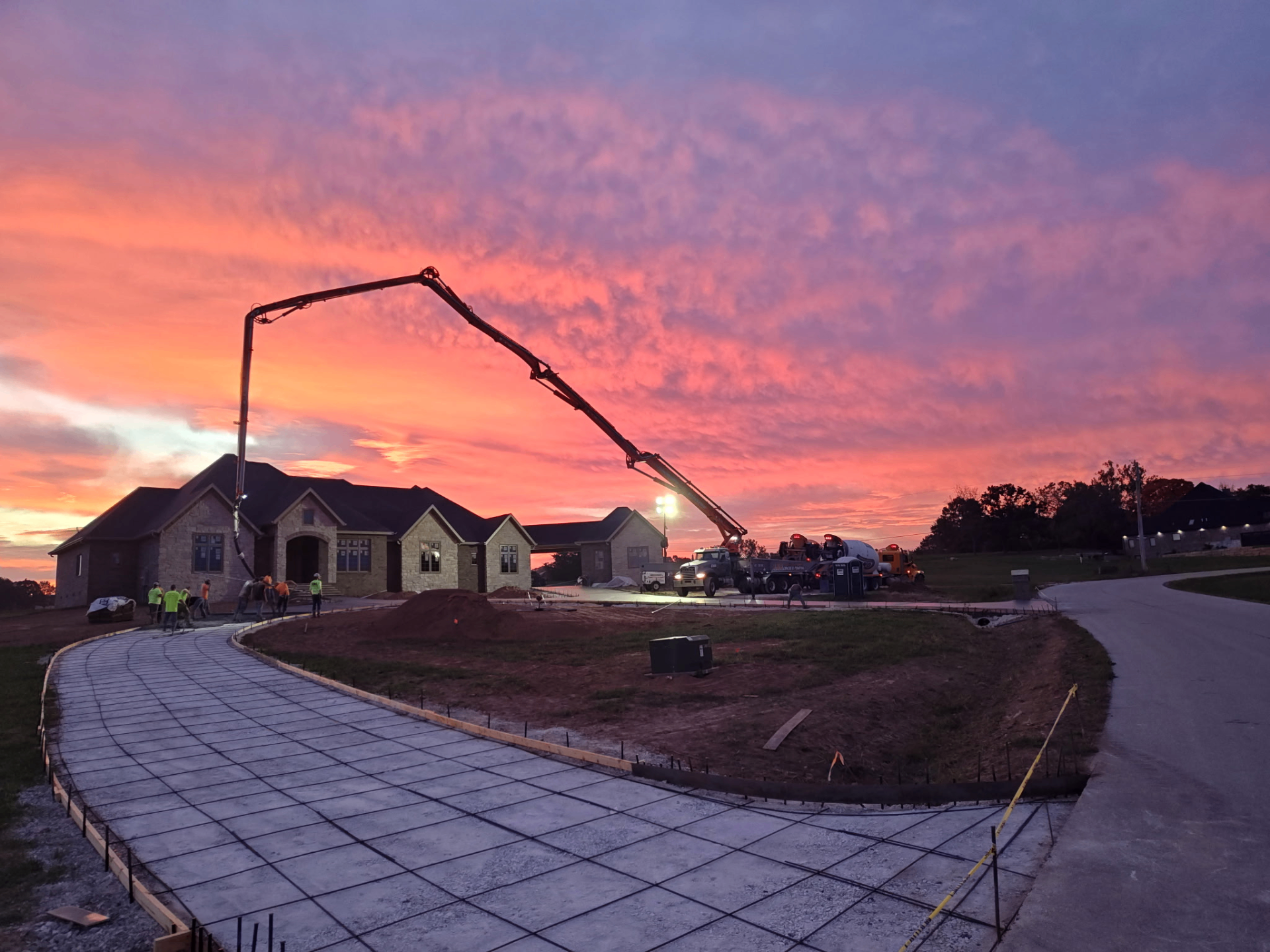 Freshly poured concrete driveway by CD Concrete in Statesboro GA at golden hour